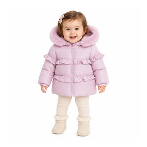 An infant styled in the Pramie lavender ruffle coat during an outdoor autumn outing.