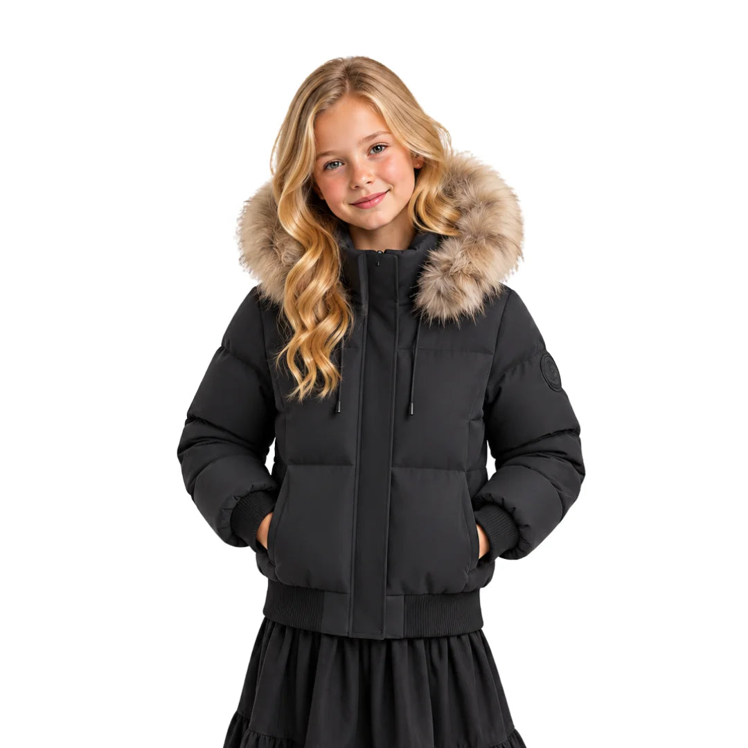 A youth styled in the Pramie black scuba fur bomber jacket