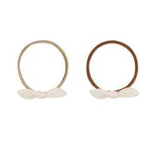 A front view of the Quincy Mae natural organic cotton little knot headbands.