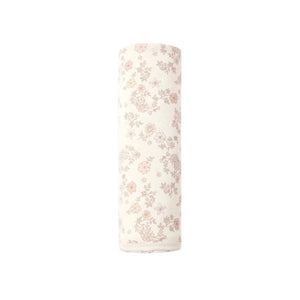 A flat lay view of the Quincy Mae vine floral organic cotton baby swaddle blanket.