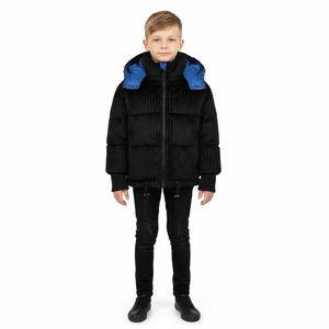 Child wearing a black puffer jacket with blue accents on a white background