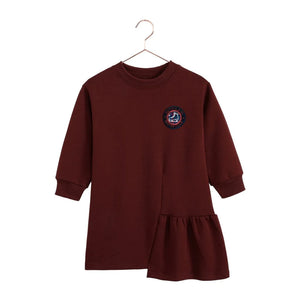 A beautifully styled RetroKid Arden dress in cranberry red featuring delicate side ruffles for babies and toddlers front