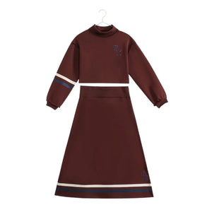A beautifully structured RetroKid Arden two-piece teen set featuring a top and skirt in a vibrant cranberry red scuba fabric front