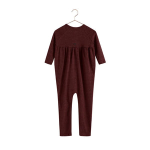 The back of the burgundy RetroKid Isla infant romper, showing its simple and clean one-piece design.