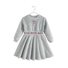 RetroKid Reese dress made of smooth gray scuba fabric with bright red accents.