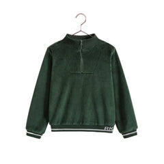 A profile view of the RetroKid green velour zip-up, highlighting the comfortable fit and front zipper.