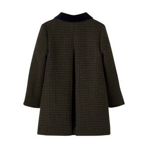 The clean back view highlighting the tailored winter coat silhouette.