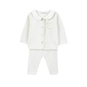 A front view of the Tartine et Chocolat ecru newborn outfit with a Peter Pan collar and hedgehog embroidery.