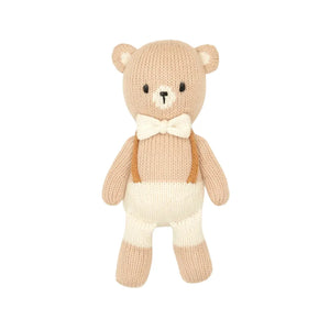 A flat-lay view of the Tuntun baby bear with bow tie in natural 8 inches.