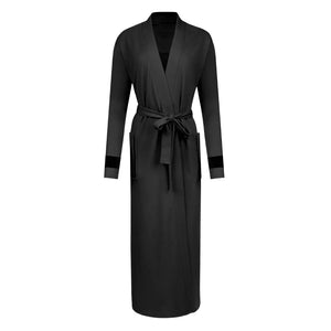 A breathtaking Velvette Pima and Modal Wrap Robe in Rose, Black, and Grey, showcasing its authoritative architectural modest fit and refined color-block texture black