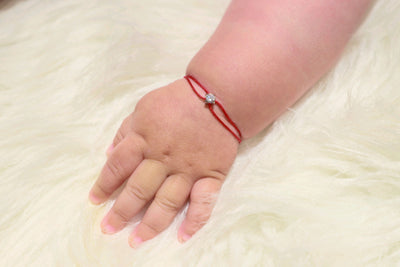 red string stone bracelet