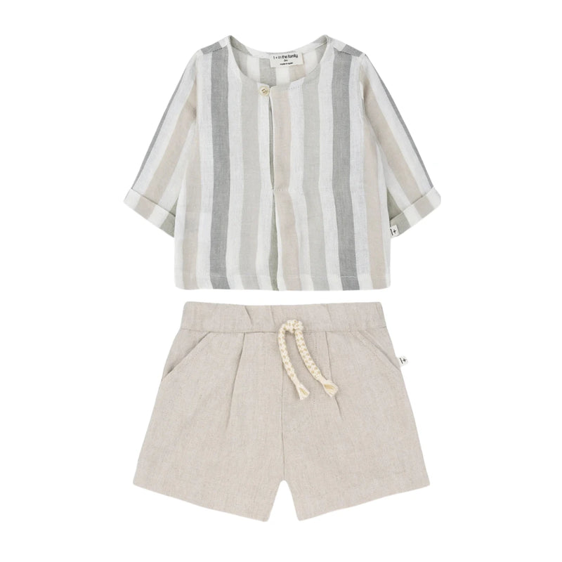 Striped shirt and beige shorts set on a white background