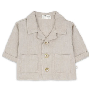 A sophisticated 1+ in the Family Jacket in a muted beige tone, showcasing its structured silhouette and high-end boutique finish.