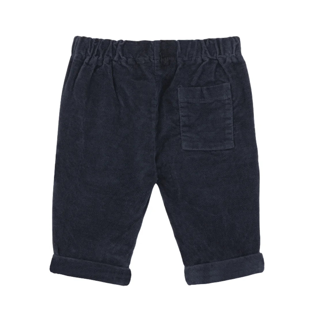Navy blue pants with a pocket on a white background