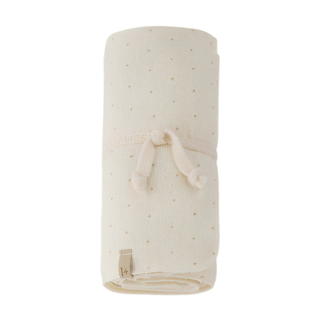 Beige baby swaddle with a drawstring on a white background