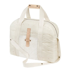 A sleek, neutral ecru 1+ in the Family maternity diaper bag styled for everyday use.