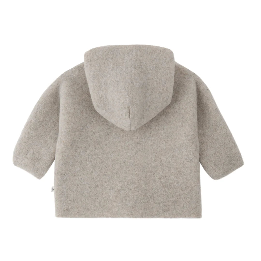 A cozy 1+ in the Family LILLE hooded baby jacket in a warm, neutral beige color.