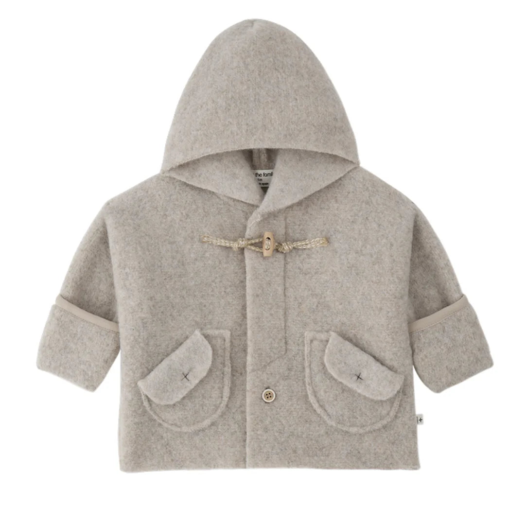 A cozy 1+ in the Family LILLE hooded baby jacket in a warm, neutral beige color.