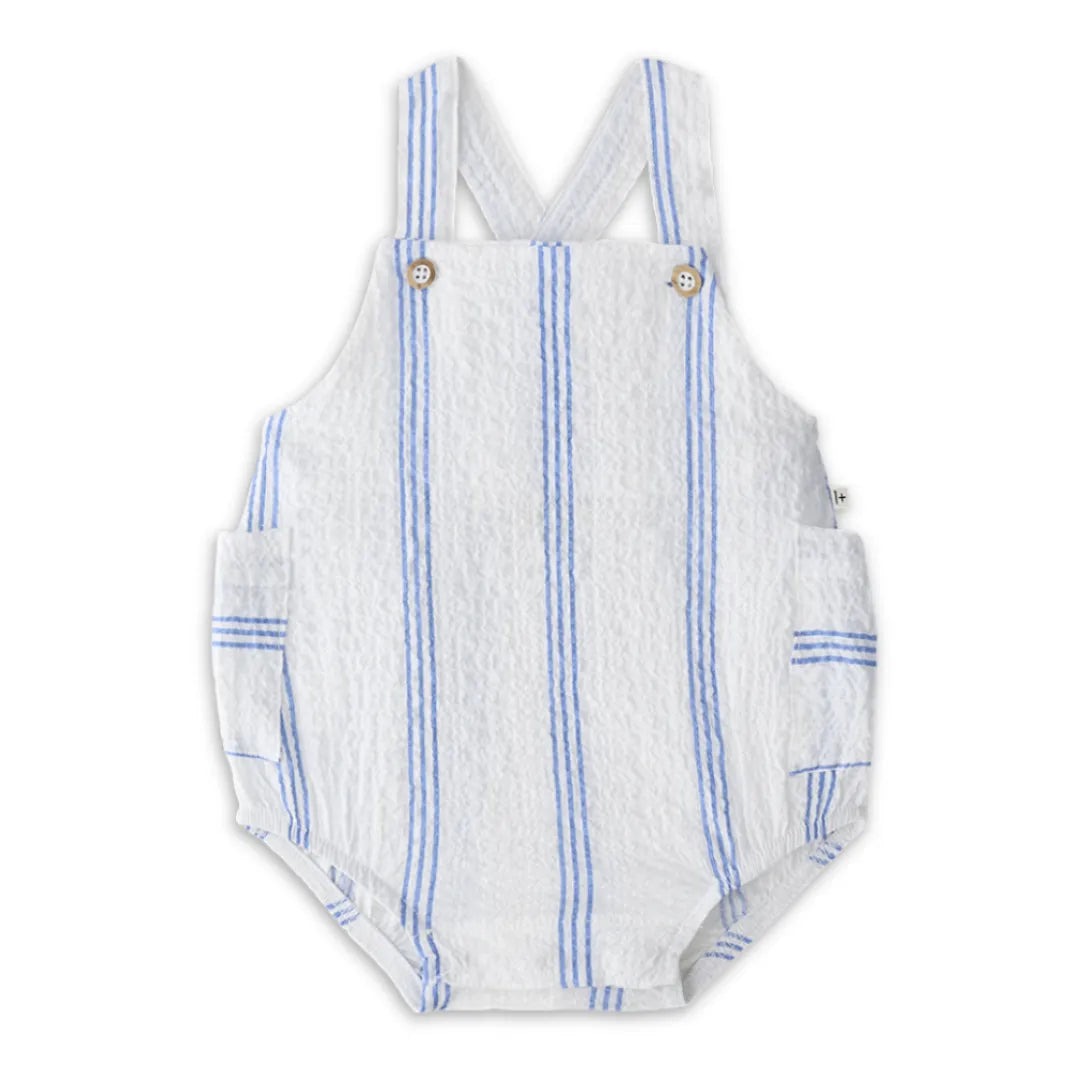 A high-end 1+ in the Family Portitxol Romper in a soft neutral textured knit, showcasing the modern architectural drape and minimalist boutique finish.