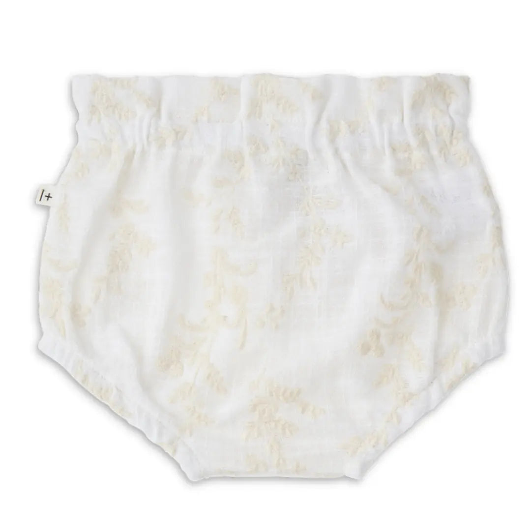 A minimalist pair of 1+ in the Family Ulla Bloomers in an ecru cotton finish, showcasing the clean lines and high-end boutique aesthetic.