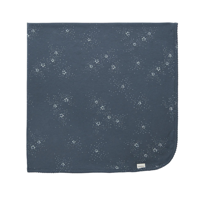 Navy blue fabric with white floral pattern on a white background