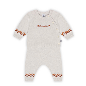 Baby romper with 'p'tit coeur' text and zigzag patterns on a white background