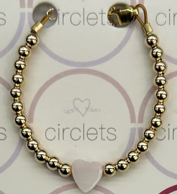 CIRCLETS GOLD BEADS PINK HEART CENTER