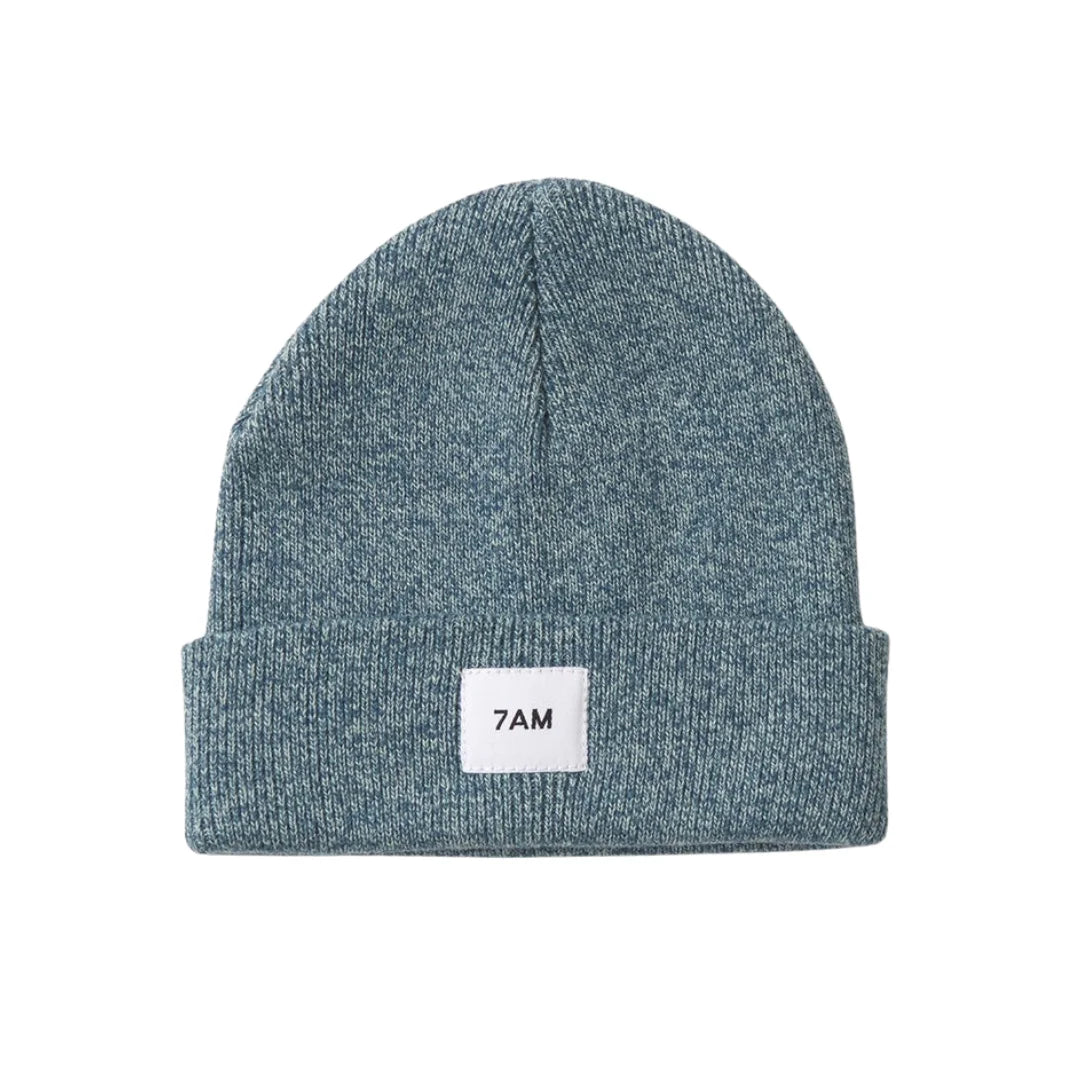 A flat-lay view of the 7AM Enfant beanie in aqua.