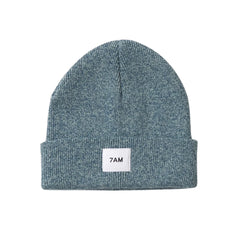 A flat-lay view of the 7AM Enfant beanie in aqua.