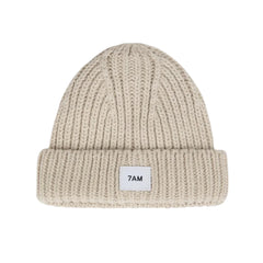 A flat-lay view of the 7AM Enfant chunky beanie in sand.