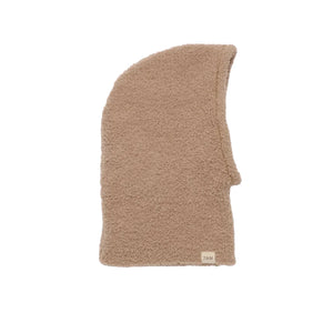 A flat-lay view of the 7AM Enfant fleece bonnet in pecan.