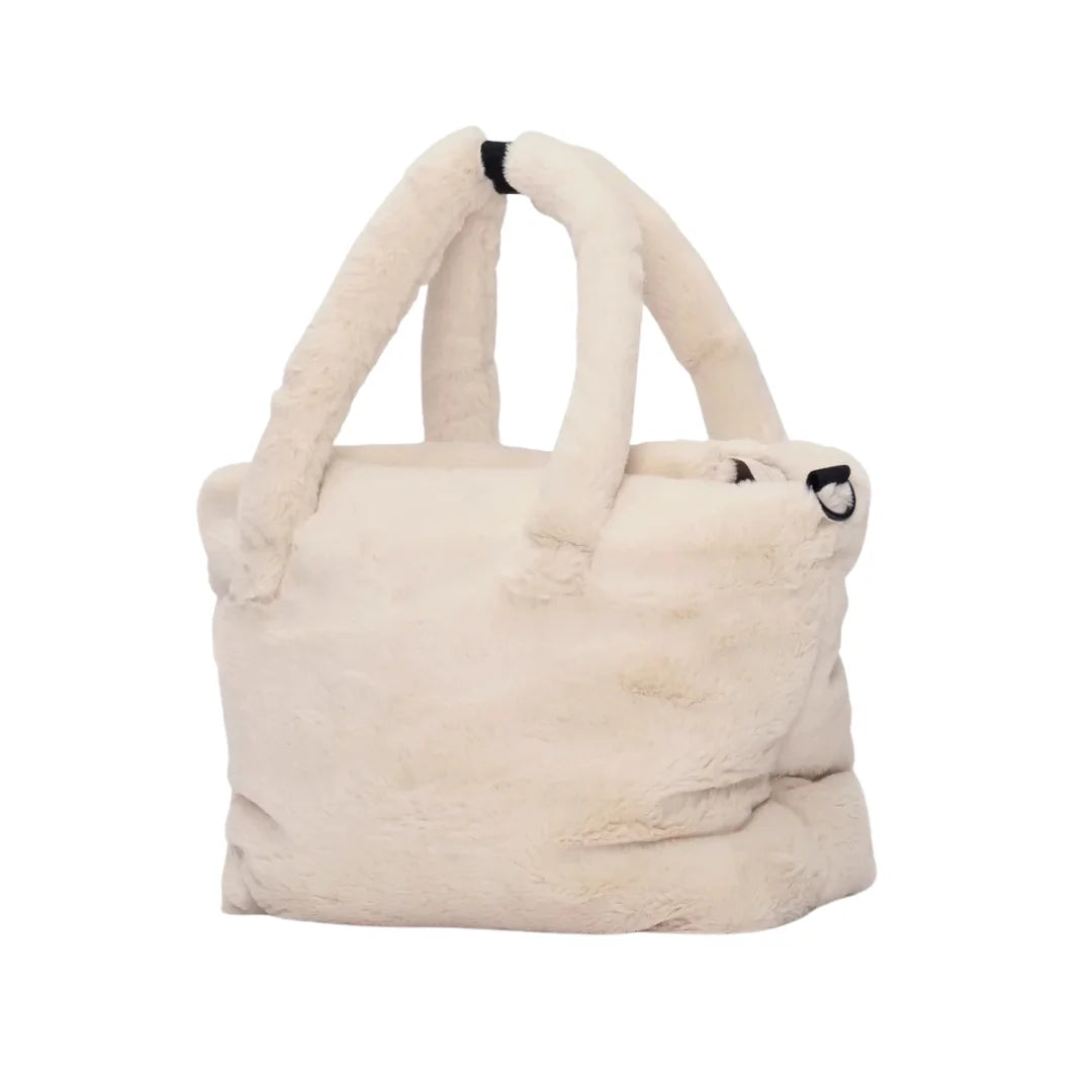 A high-resolution close-up of the plush faux fur trim and interior pockets.