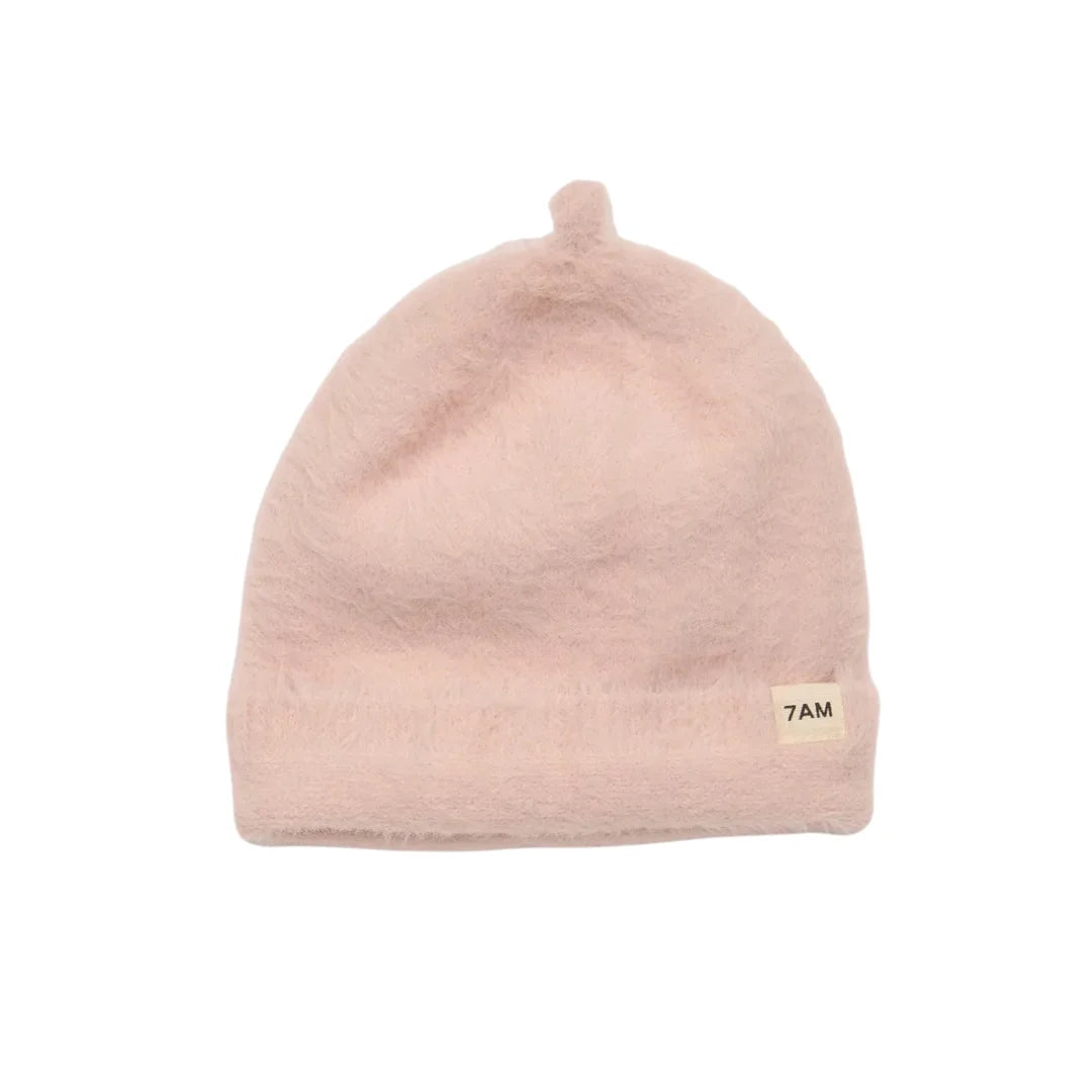 A flat-lay view of the 7AM Enfant Tuscan in powder pink.