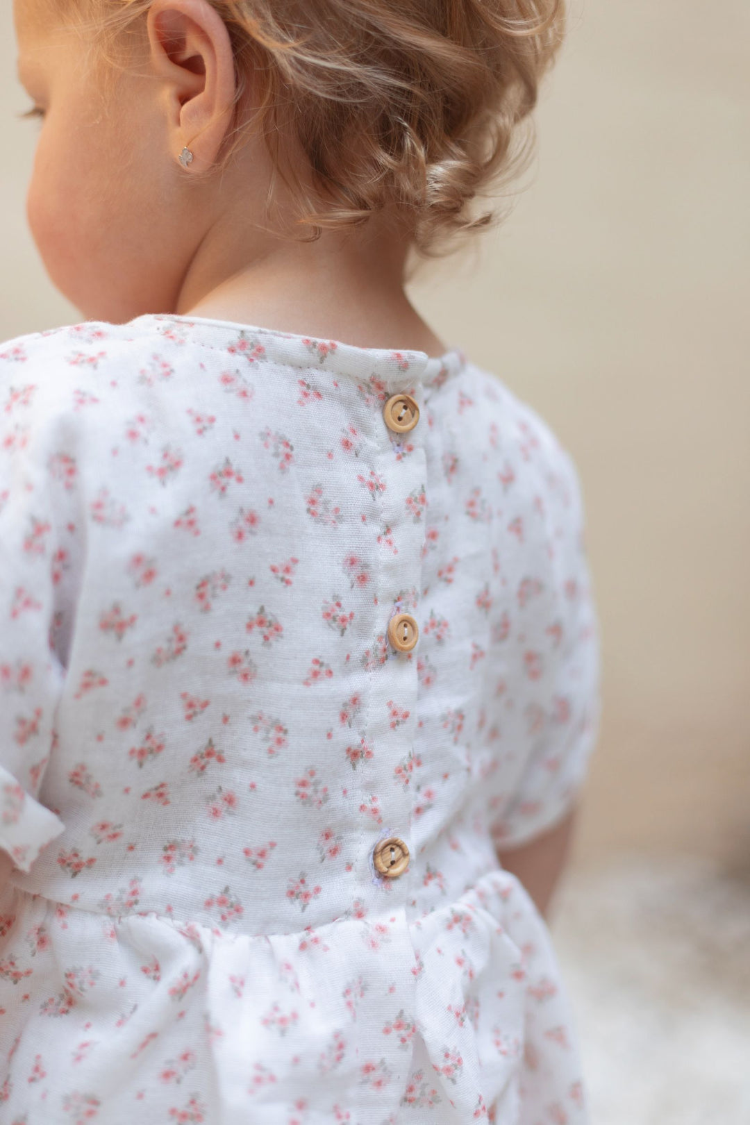 Cotton Little Things
 - Short-sleeved floral dress with bow