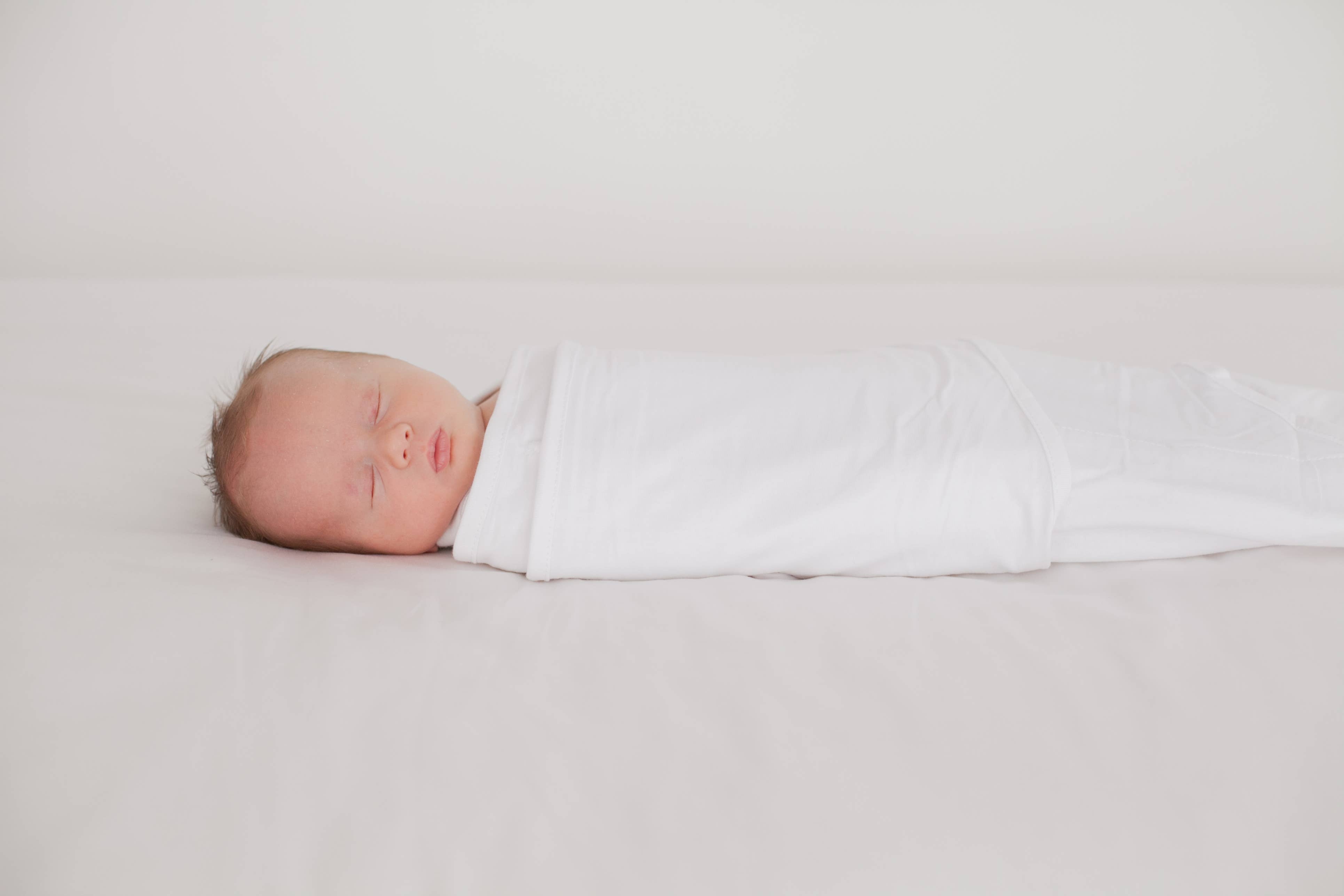 Miracle Blanket- The #1 Pediatrician-recommended Swaddle - Solid White Miracle Blanket