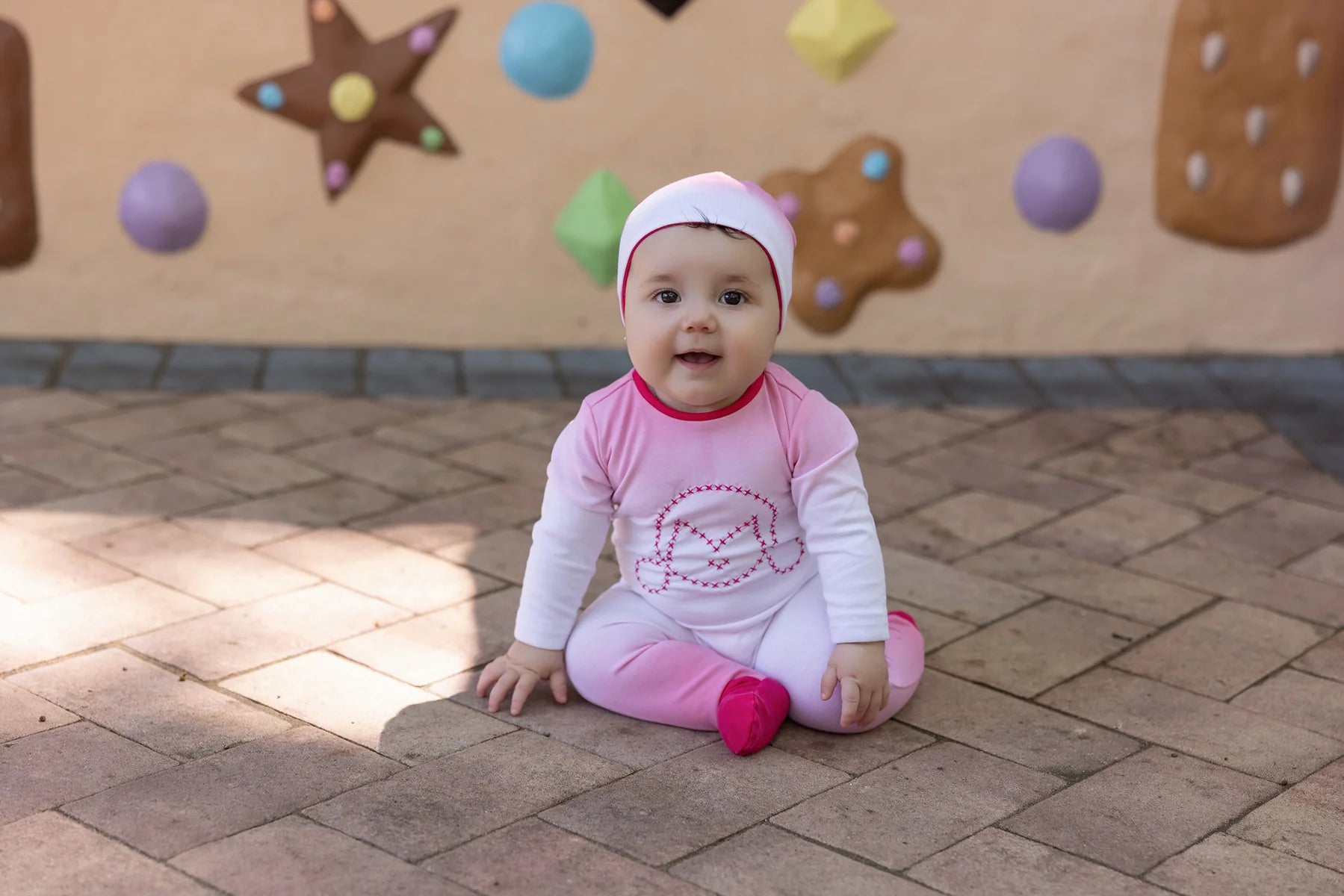Miss Mini Cross Stitch girls romper in soft cotton, cozy one piece outfit with embroidered detail