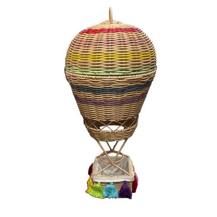 Wicker hot air balloon with colorful basket on a white background