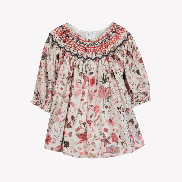 Floral dress with long sleeves on a white background