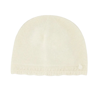 White knit beanie on a white background