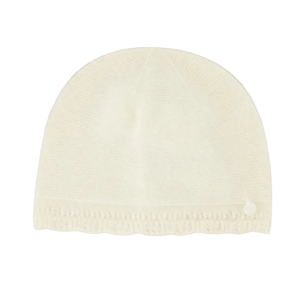 White knit beanie on a white background