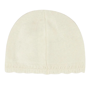 White knit beanie on a white background