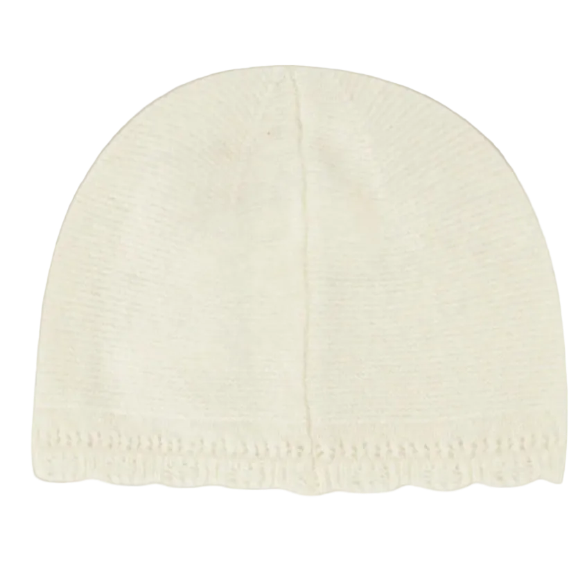 White knit beanie on a white background