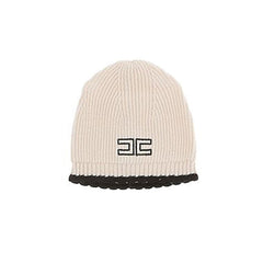 Beige knit beanie with black logo on a white background