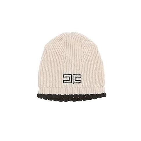 Beige knit beanie with black logo on a white background