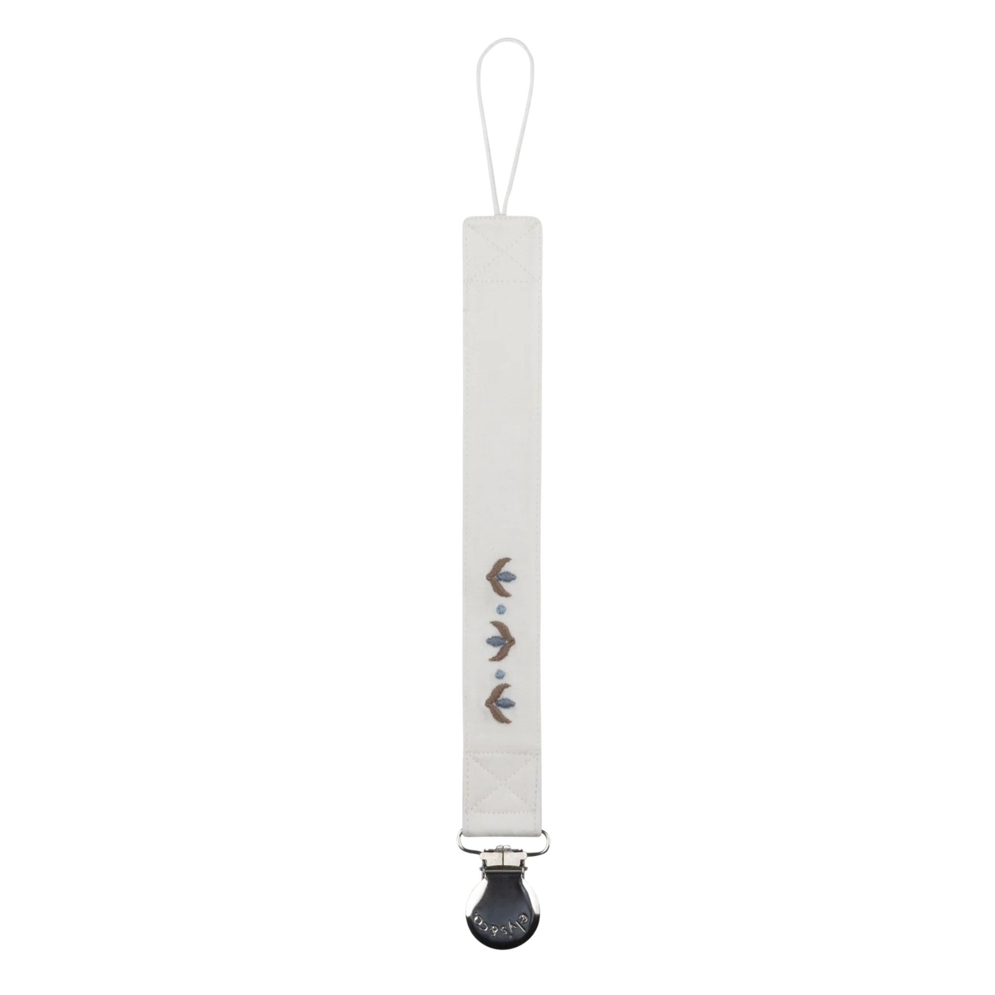 White pacifier clip with decorative elements on a white background
