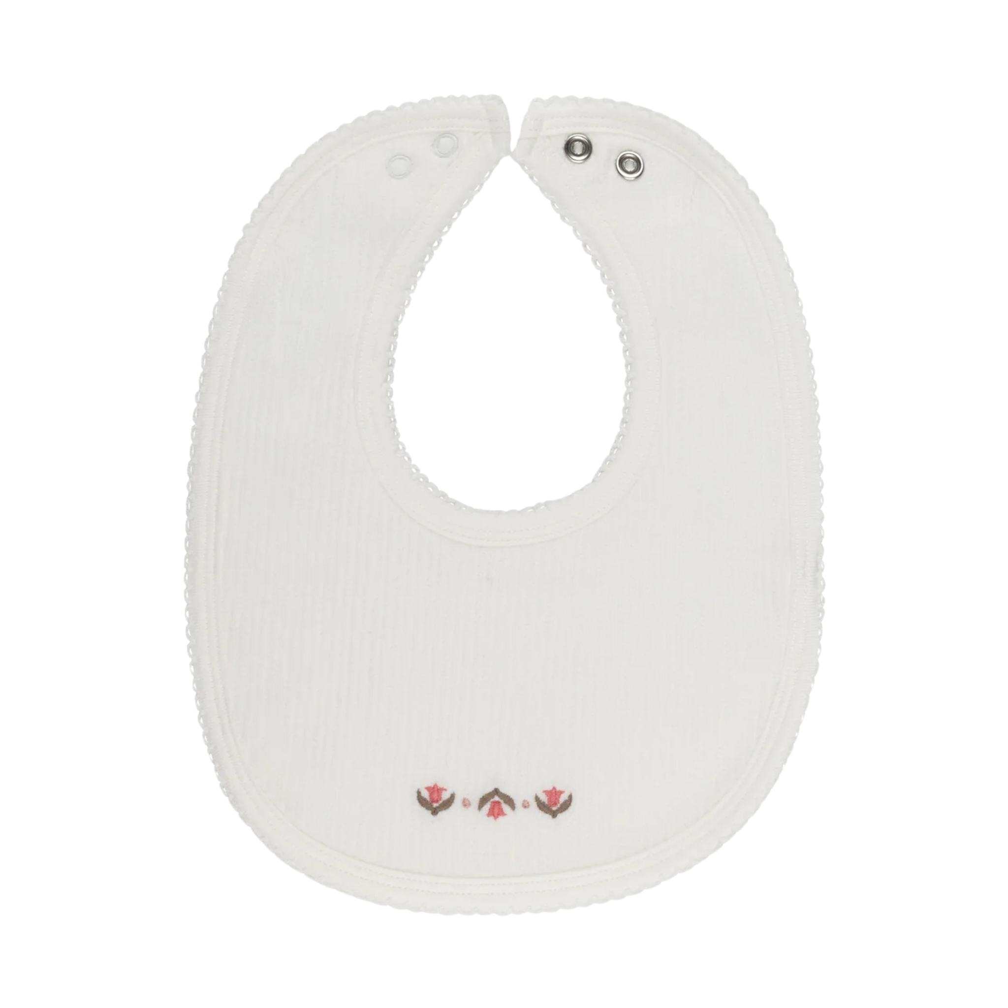 White baby bib with a small design on a white background