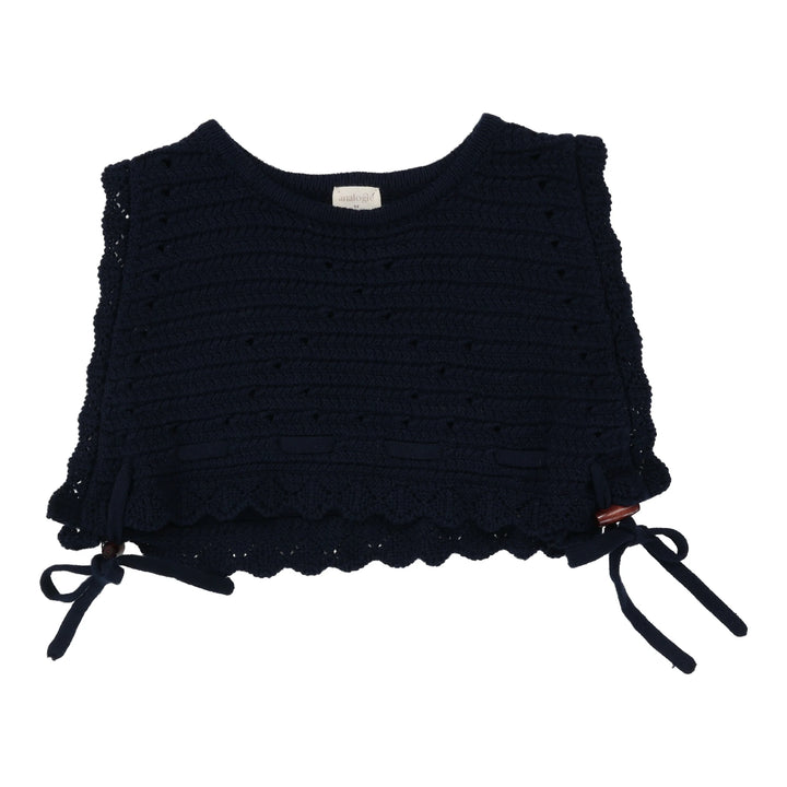 Black crochet top with scalloped edges and tie details on a white background