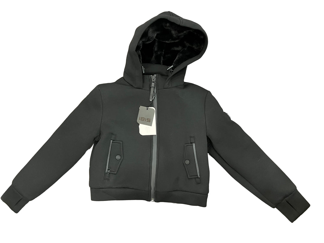 Black jacket with a tag on a wooden floor