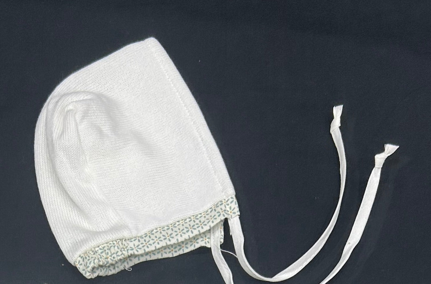 Knit bonnet with printed trim