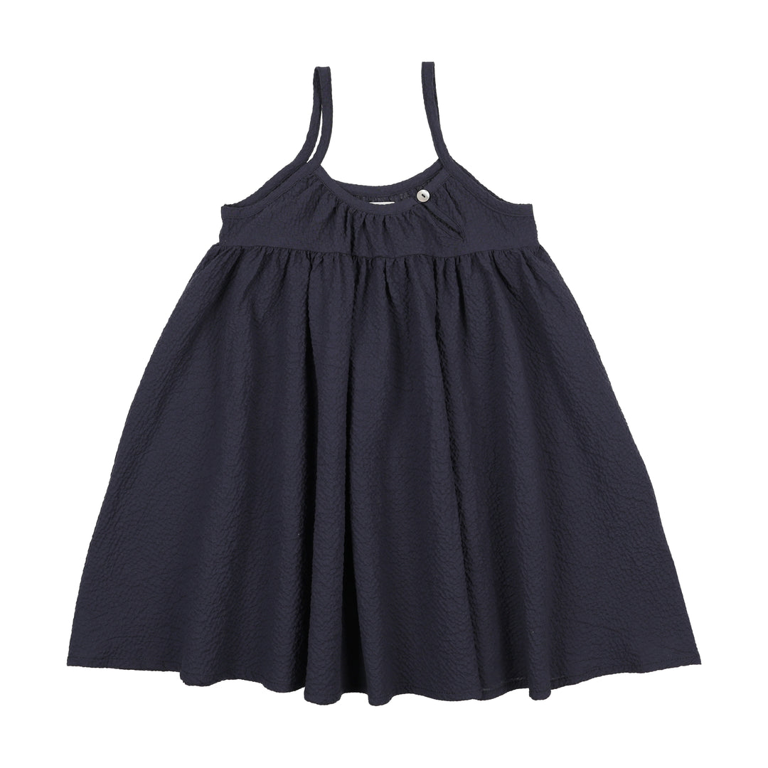 Navy blue dress with thin straps on a white background